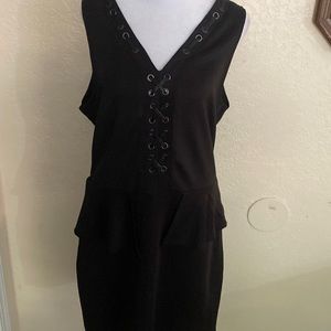 Just Fab black peplum dress with leather laces detailing.